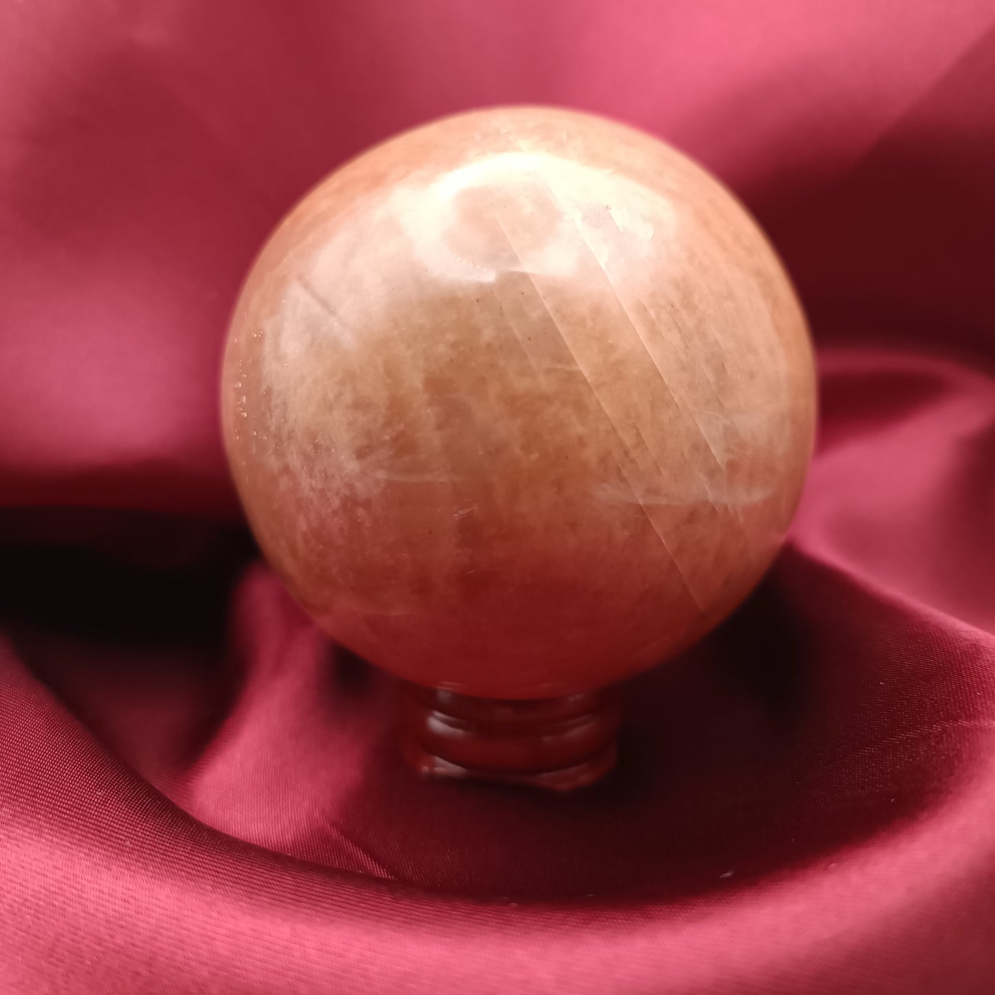 Sphère en pierre de lune orange - 60-70 mm